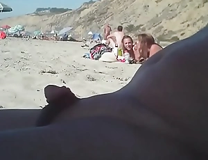 Man with a small pecker on a difficulty nudist beach