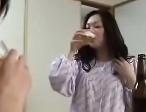 Japanese milf withyoung boy drink with an increment of fuck