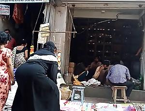 Indian muslim aunty seated ass at one's fingertips market