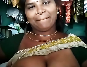 Downcast Tamil aunty showing her boobs